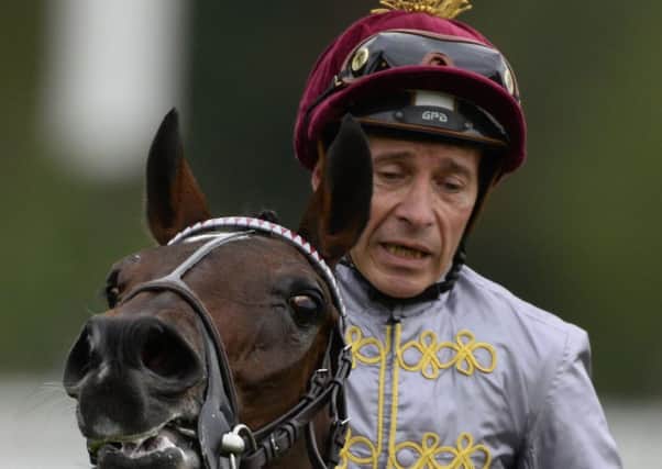 Thierry Jarnet after riding Treve to a second Arc victory at Longchamps last year. Picture: Getty