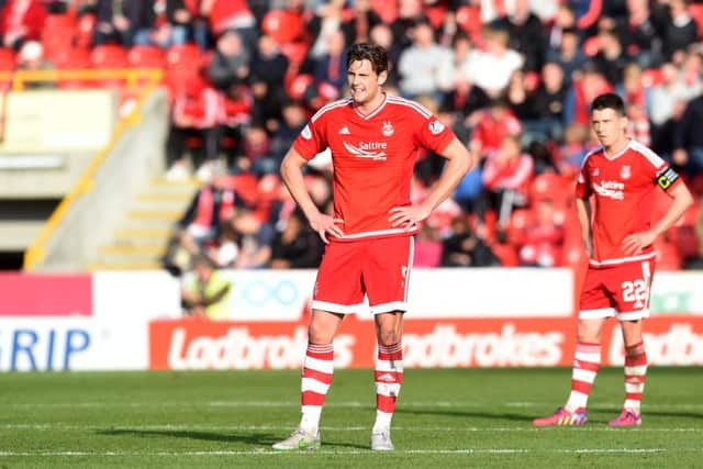 Aberdeen's Ash Taylor, left, and Ryan Jack stand dejected. Picture: SNS
