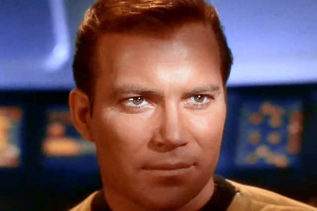 William Shatner as Captain Kirk.