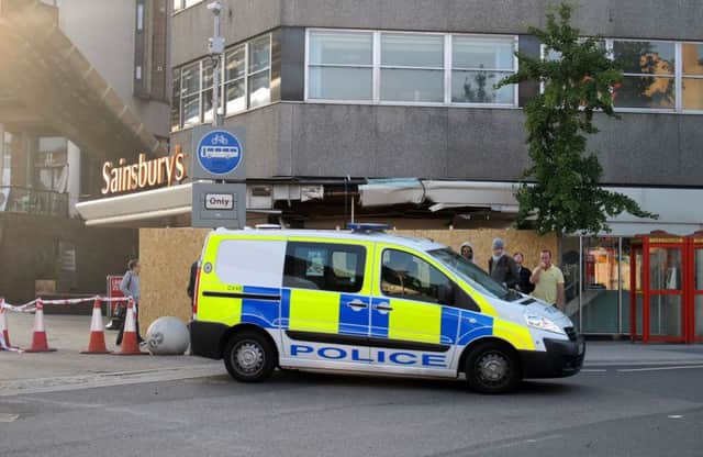 The scene outside the Sainsbury's store in Trinity Street, Coventry. Picture: PA