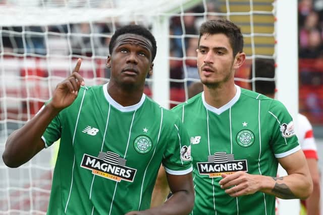Dedryck Boyata (left) celebrates after equalising for his side. Picture: SNS