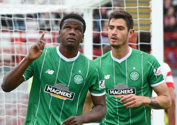 Dedryck Boyata (left) celebrates after equalising for his side. Picture: SNS