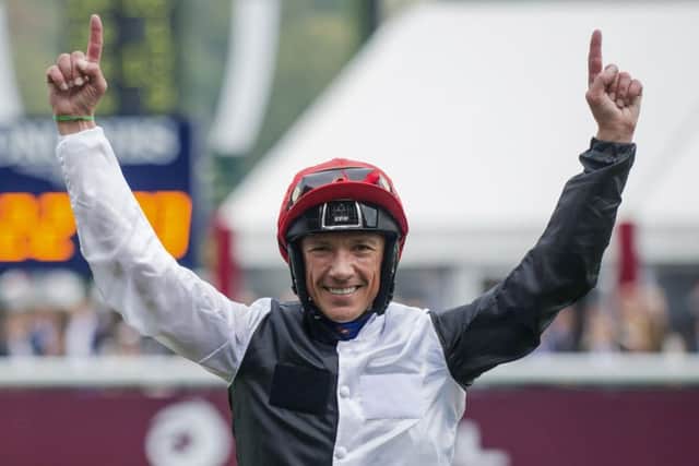 Frankie Dettori celebrates winning the Prix de lArc de Triomphe. Picture: AP