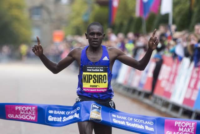 Ugandan great Moses Kipsiro crosses the finishing tape first. Picture: PA