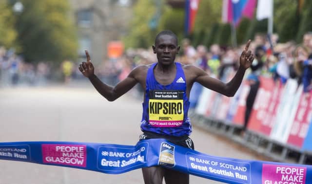 Ugandan great Moses Kipsiro crosses the finishing tape first. Picture: PA