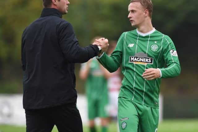 Celtic manager Ronny Deila congratulates Leigh Griffiths after Celtic came from behind to beat Hamilton Accies 2-1. Picture: SNS