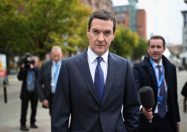 George Osborne is trailled by the media as he makes his way to his partys annual conference. Picture: Getty