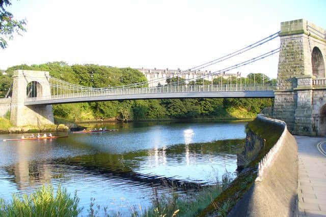 Wellington Suspension Bridge in Aberdeen regularly sees rowers from Aberdeen and Robert Gordon universities pass under it. Picture: Colin Smith.
