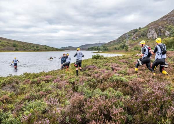 Athletes compete at the Loch Gu Loch swimrun earlier this year. Picture: Steve Ashworth