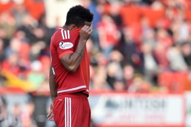 Shay Logan is dejected after Aberdeen's 5-1 defeat to St Johnstone. Picture: SNS