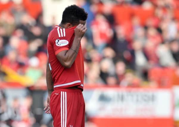 Shay Logan is dejected after Aberdeen's 5-1 defeat to St Johnstone. Picture: SNS