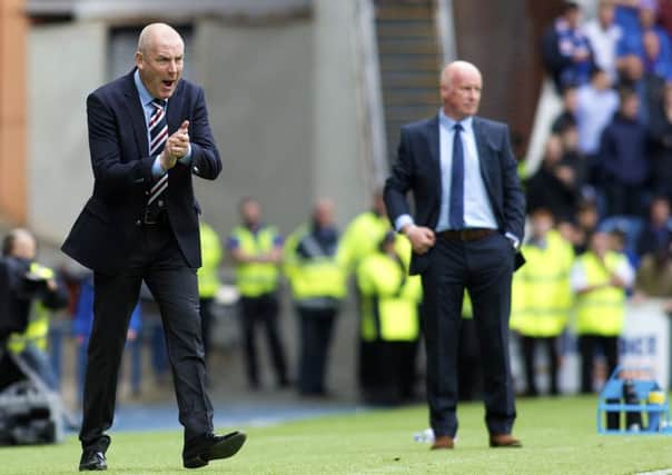 Mark Warburton and Peter Houston at Ibrox. Rangers won 3-1 but Falkirk boss Houston wasn't happy with the referee. Picture: Kirk O'Rourke