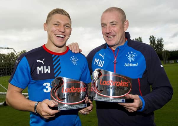 Player of the month Martyn Waghorn, left, and his Rangers manager Mark Warburton are all smiles after picking up their awards. Picture: SNS Group