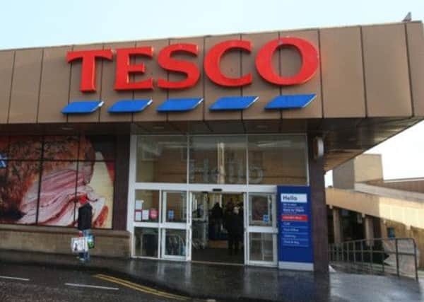 Tesco said its sales performance in the UK was improving