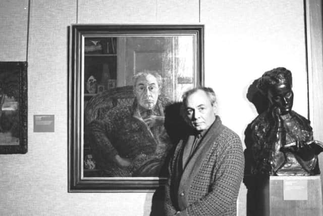 Scottish psychologist and philosopher RD Laing (Ronald David Laing) beside a portrait of himself by Victoria Crowe at the Scottish National Portrait Gallery in Edinburgh February 1985.