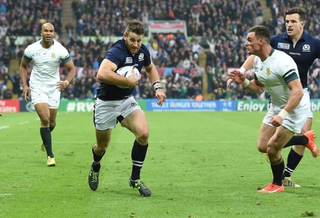 Tommy Seymour is a picture of concentration as he rampages towards the line to score in Scotlands defeat by South Africa. Picture: Getty