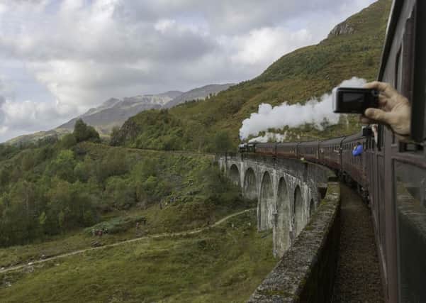 Police have warned tourists of the dangers of trespassing on railway lines after tourists were seen on the Glenfinnan viaduct. Picture: PA