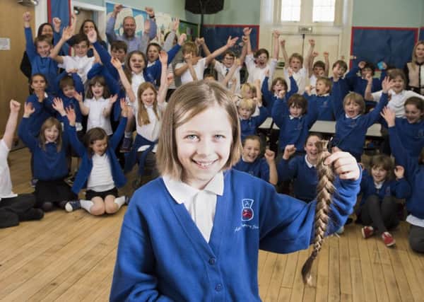 The trustmake real hair wigs for children who have lost their hair due to cancer treatment and other serious illness. Picture: Andy Thompson