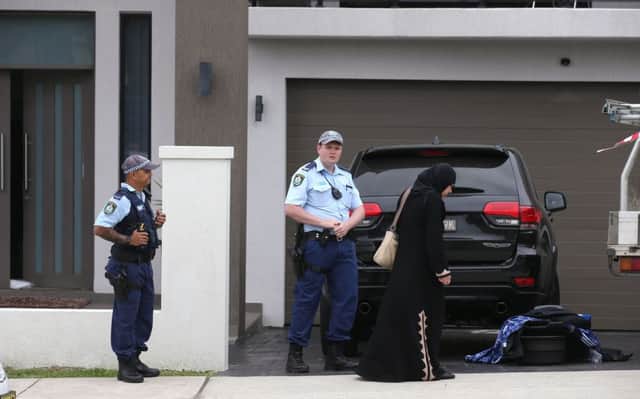 Police outside a property in the Sydney suburb of Merrylands. Picture: AP