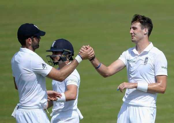 Steven Finn, right, celebrates with Liam Plunkett after dismissing Pakistan As Ali Asad. Picture: Getty