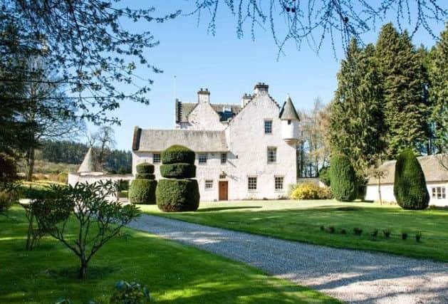 The property, with its crow-stepped gables and turrets, is surrounded by beautiful countryside. Picture: Savills
