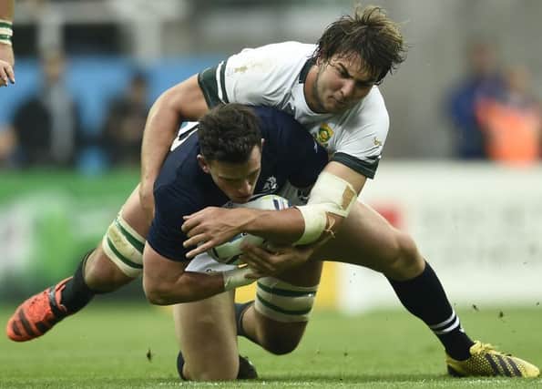 Matt Scott pictured being tackled by South Africa's Lood de Jager in Scotland's previous game. Picture: Getty
