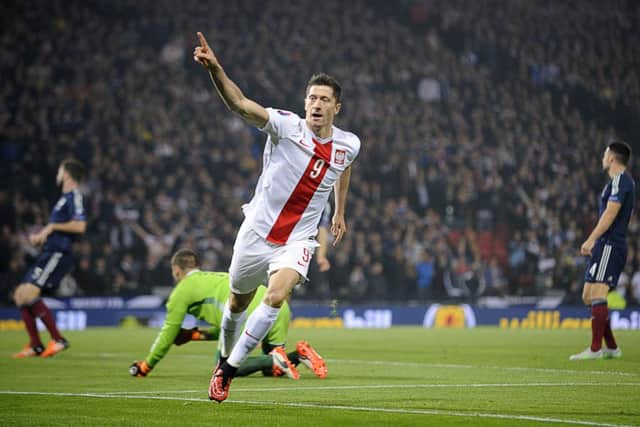 Polands Robert Lewandowski celebrates after scoring the opening goal against Scotland. Picture: Getty
