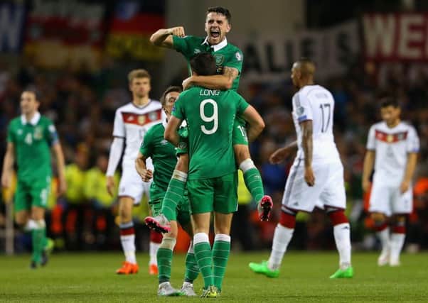 Robbie Brady and Shane Long celebrate at full-time. Picture: Getty