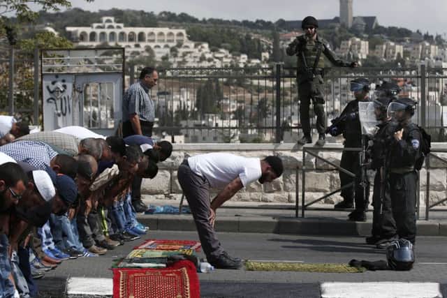 Israeli security forces stand guard during the Friday prayers in Jerusalems Old City. Picture: Getty