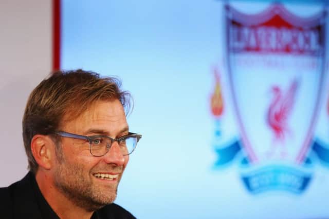 Jurgen Klopp was unveiled as the new manager of Liverpool yesterday in front of a packed press conference at Anfield. Picture: Getty