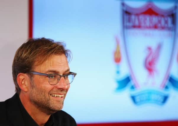 Jurgen Klopp was unveiled as the new manager of Liverpool yesterday in front of a packed press conference at Anfield. Picture: Getty