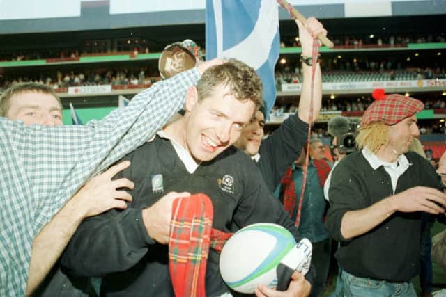 Scotland fans mob Hastings after his last international against New Zealand in the 1995 World Cup in South Africa. Picture: Ian Rutherford