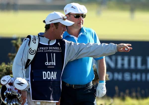 Chris Doak with his caddie at The Old Course last week. Picture: Getty