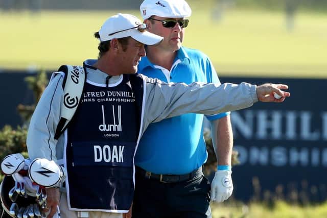 Chris Doak with his caddie at The Old Course last week. Picture: Getty
