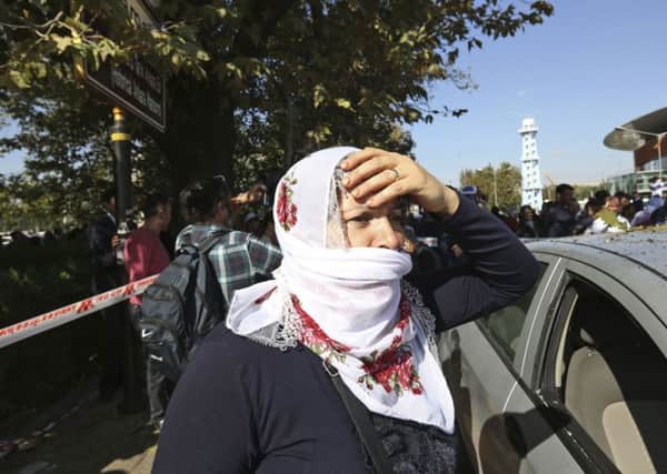 A woman reacts at the site of an explosion in Ankara. Picture: AP