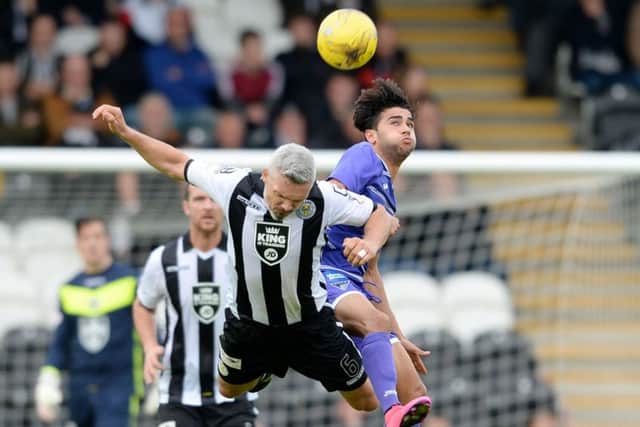 St Mirren captain Jim Goodwin, left, battles for the ball with Dunfermlines Faissal El Bakhtaoui during Saturdays quarter-final clash. Picture: SNS Group