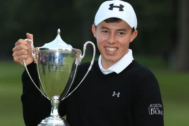 Matt Fitzpatrick holds the trophy after becoming the youngest winner of the British Masters. Picture: PA