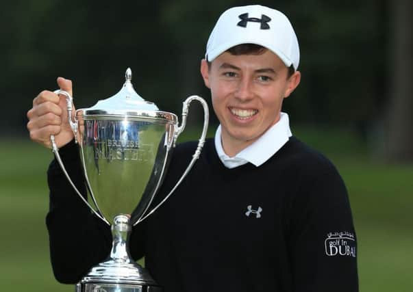 Matt Fitzpatrick holds the trophy after becoming the youngest winner of the British Masters. Picture: PA