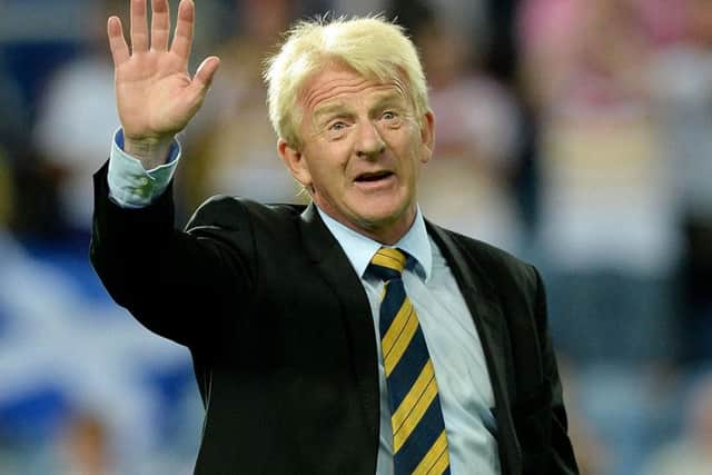 An emotional Gordon Strachan acknowledges the support of the Tartan Army at the end of last nights 6-0 win over Gibraltar in Faro. Picture: PA