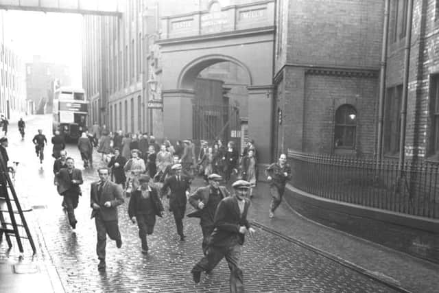 North British Rubber Company workers leave at the end of a shift. Picture: TSPL