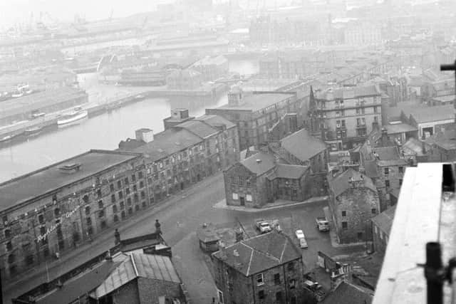 A view towards Leith docks in 1962 with Commercial Street in the foreground. The old East Dock in the centre of the picture was later infilled and is now the site of Victoria Quay, a 1990s office development housing civil servants.
