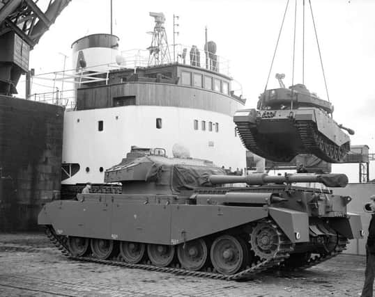 Ten centurion tanks are loaded on board en route to Sweden in 1952. Picture: TSPL