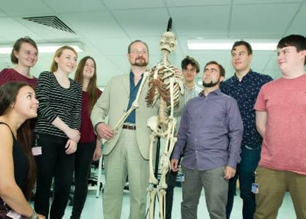 University of Dundee's iGEM team with crime author Stuart MacBride. Photo: University of Dundee.