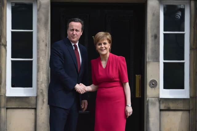 Pollsters failed to predict the election victory for the Conservatives, led by Prime Minister David Cameron, seen here with First Minister Nicola Sturgeon. Picture: Getty