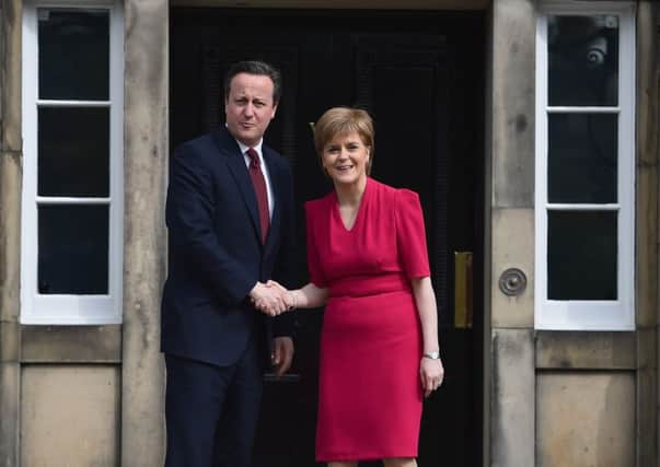 Pollsters failed to predict the election victory for the Conservatives, led by Prime Minister David Cameron, seen here with First Minister Nicola Sturgeon. Picture: Getty
