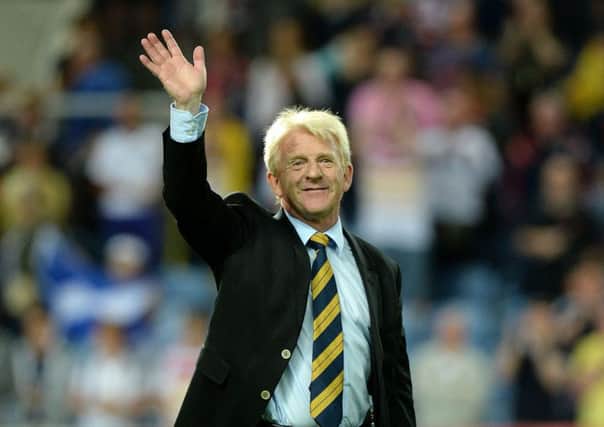 Gordon Strachan waves to the fans in Portugal, but was it a final farewell? Picture: PA