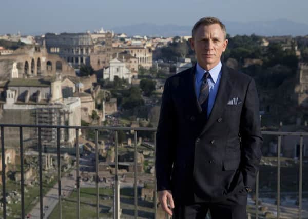 John will stand on the red carpet in New York to pipe celebrities, including Bond himself, Daniel Craig, into the first showing of Spectre.Picture: AP