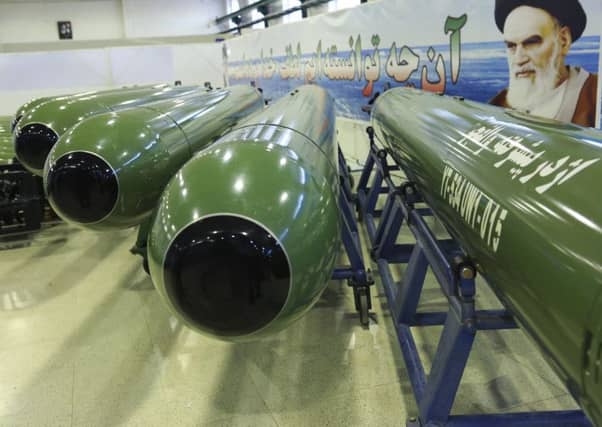 The Iranians show off a torpedo weapons system. Picture: AP