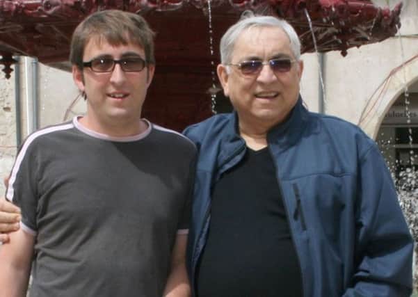 Karl Andree, right, with son Simon, who said the intervention had taken an awful long time . Picture: PA