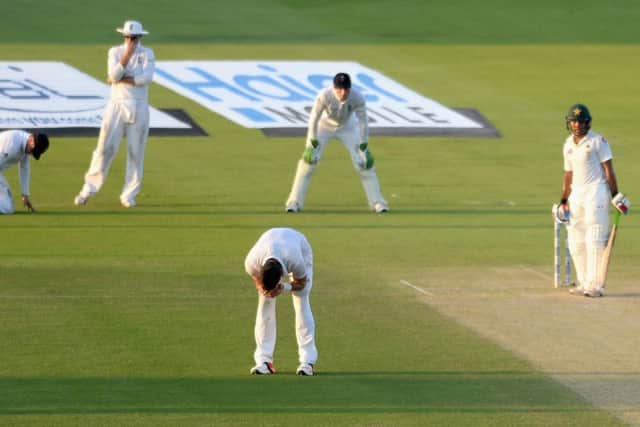 James Anderson holds his head in his hands after seeing Ian Bell drop Mohammad Hafeez at second slip. Hafeez went on to make 98. Picture: Getty